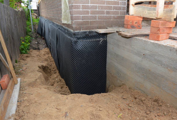 Happy homeowners after waterproofing job in Villa Park